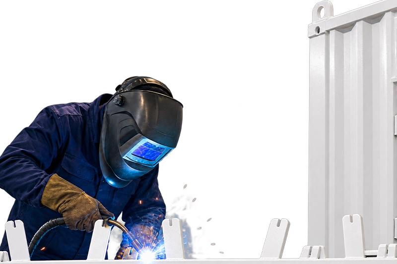 Operator wearing respiratory protection during welding work